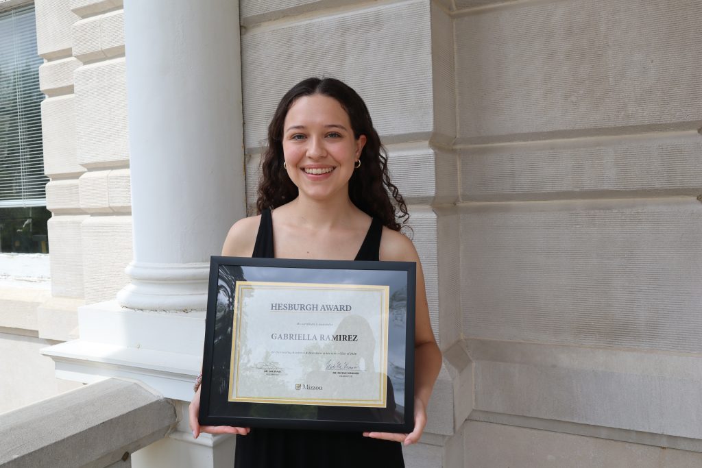 Gabriella Ramirez holding certificate.