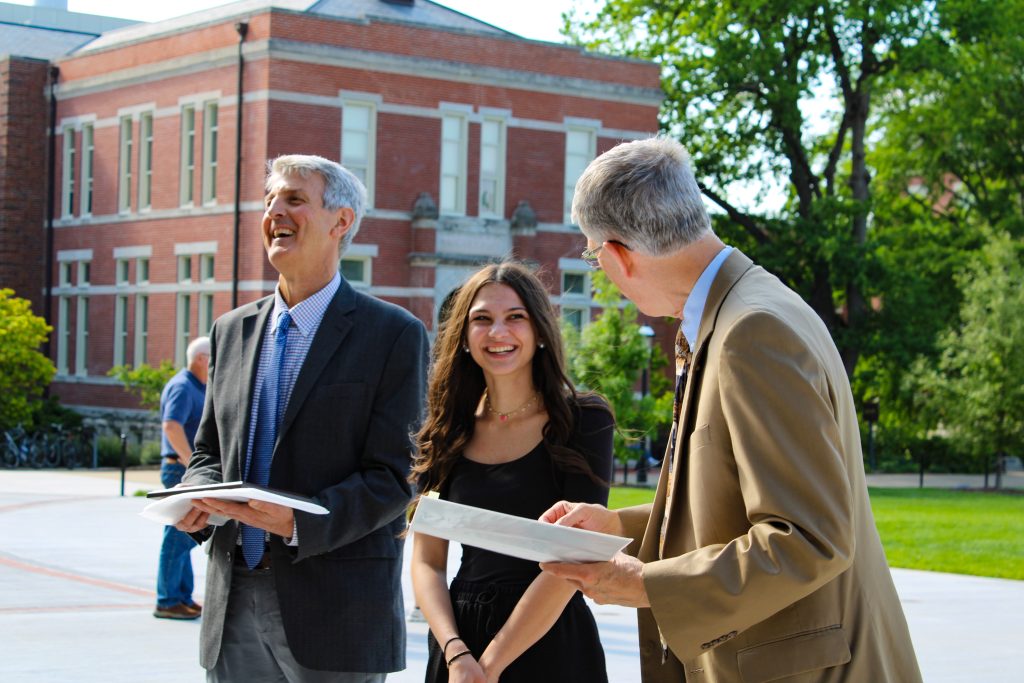 Madison Clark receives her Hesburgh award.