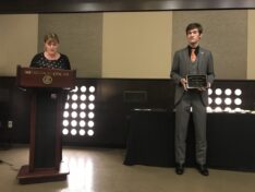 Sage Eichenburch receiving award