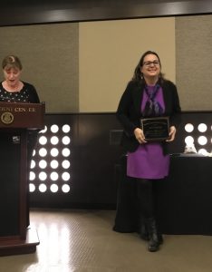 Tessi Rickabaugh receiving award